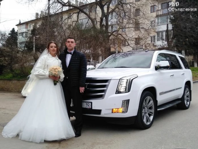 VIP-трансфер и аренда Cadillac Escalade (2020) в Крыму. Белый люкс-внедорожник на 8 человек 4