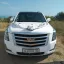 VIP-трансфер и аренда Cadillac Escalade (2020) в Крыму. Белый люкс-внедорожник на 8 человек