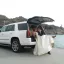 VIP-трансфер и аренда Cadillac Escalade (2020) в Крыму. Белый люкс-внедорожник на 8 человек